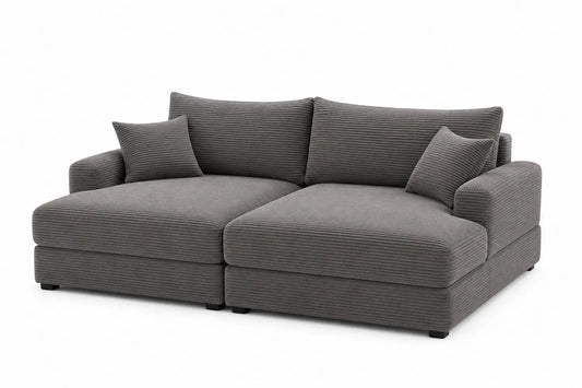 Sofá modular de tela de canalé gris con chaise longue y cojines